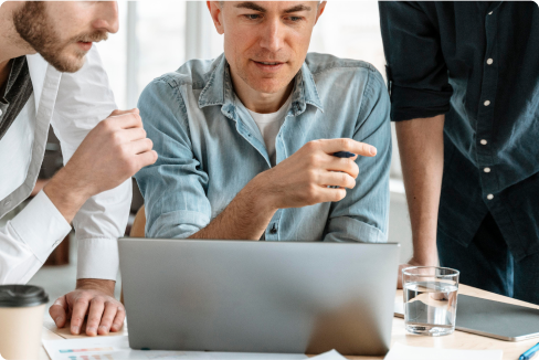 Team working together on laptop